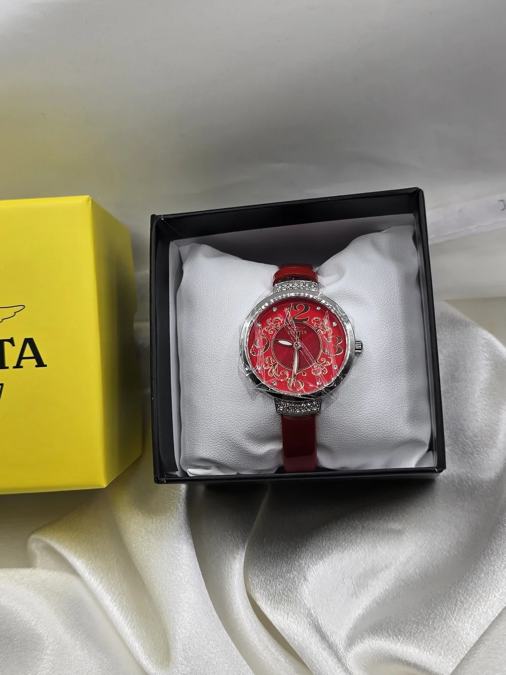 Invicta Celestial Women’s Quartz 33mm Silver Case White Dial Red Band